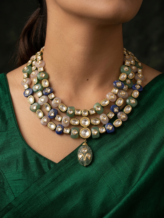 Long Kundan layering necklace with gold plating and traditional white stone embellishments