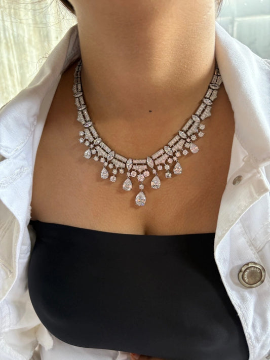 Handcrafted silver-plated necklace featuring alternating yellow and white CZ stones with a high-shine polished finish