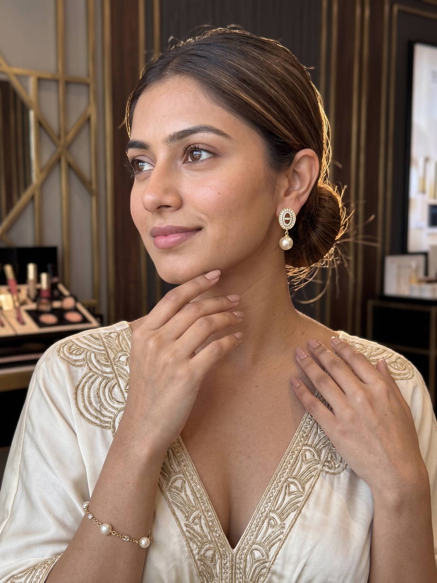Woman wearing elegant jewelry in a stylish setting