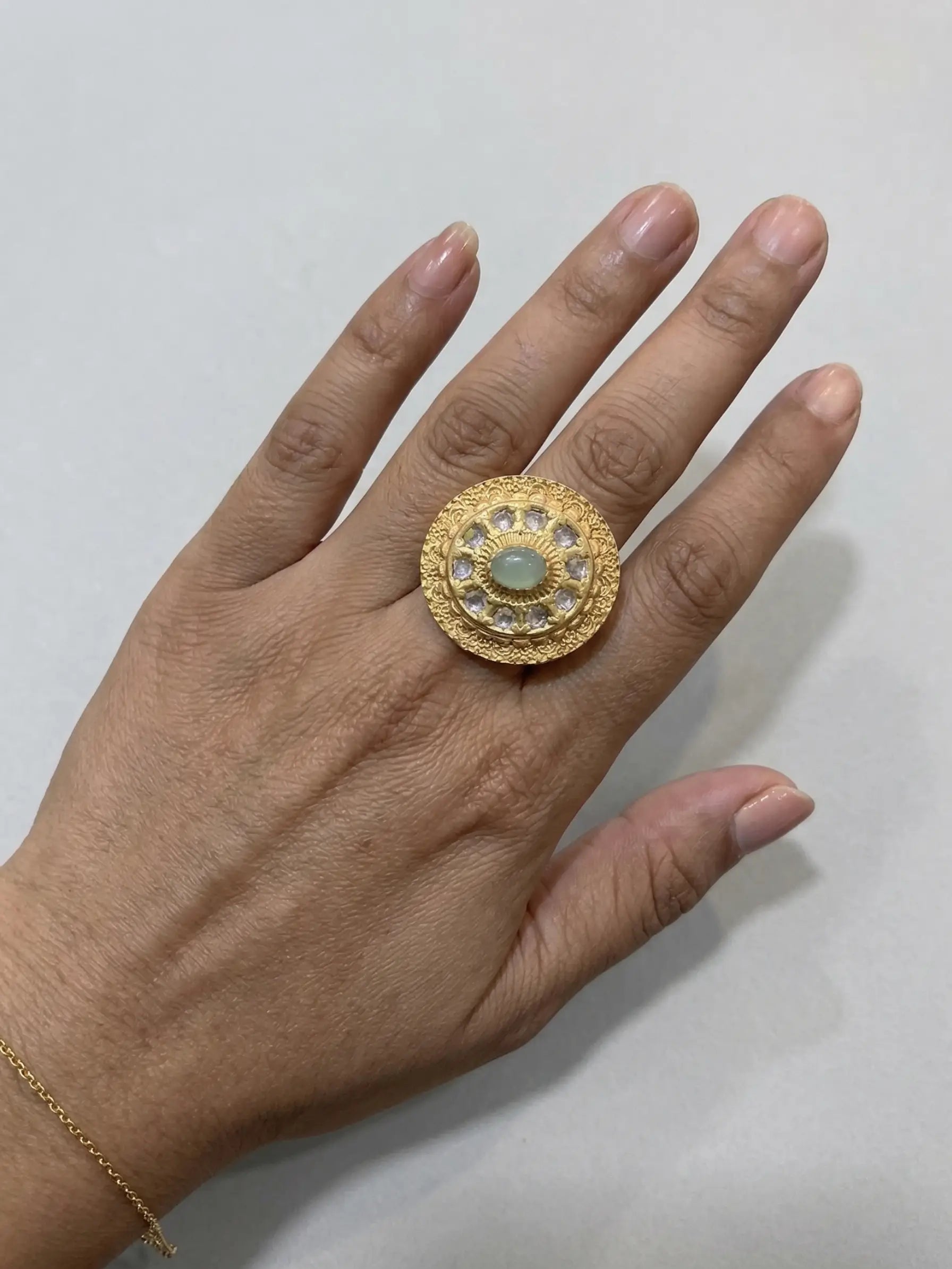 Adjustable gold-toned fashion ring for women showing the open-back design, perfect for a comfortable fit on any finger size.
