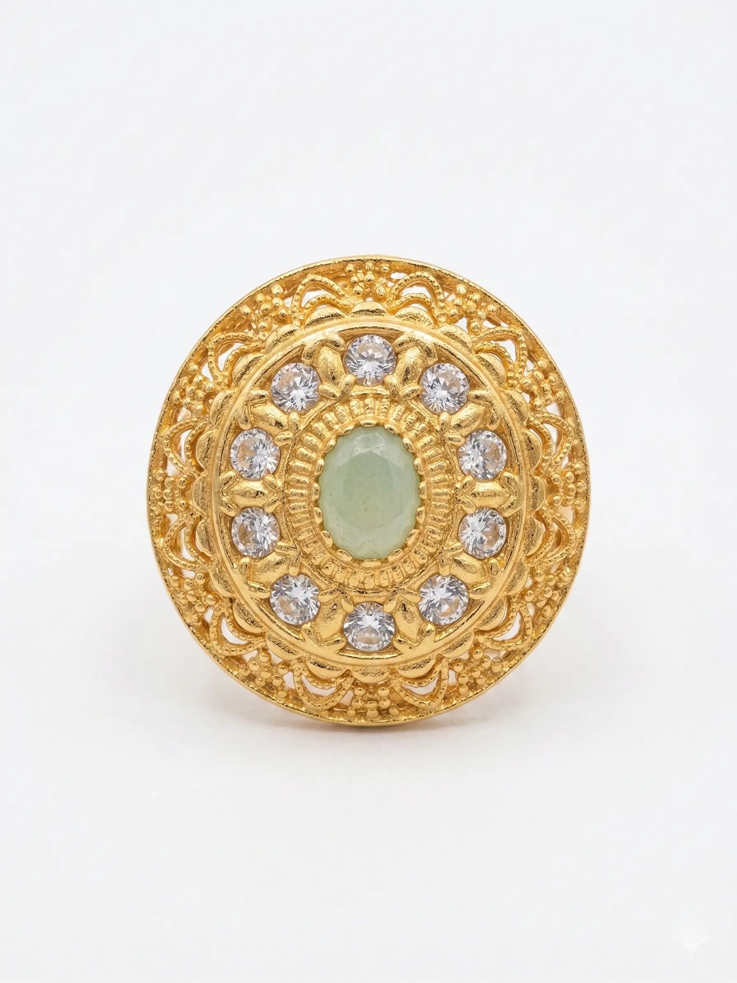 Luxury gold-finish stone ring for women, ideal for engagement or bridal wear, featuring a serene mint green center stone.