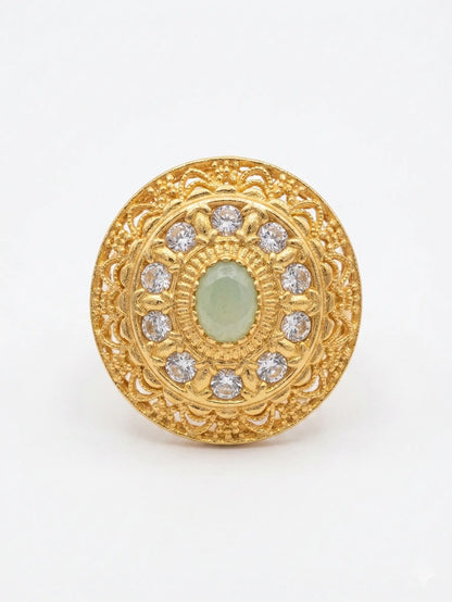 Luxury gold-finish stone ring for women, ideal for engagement or bridal wear, featuring a serene mint green center stone.