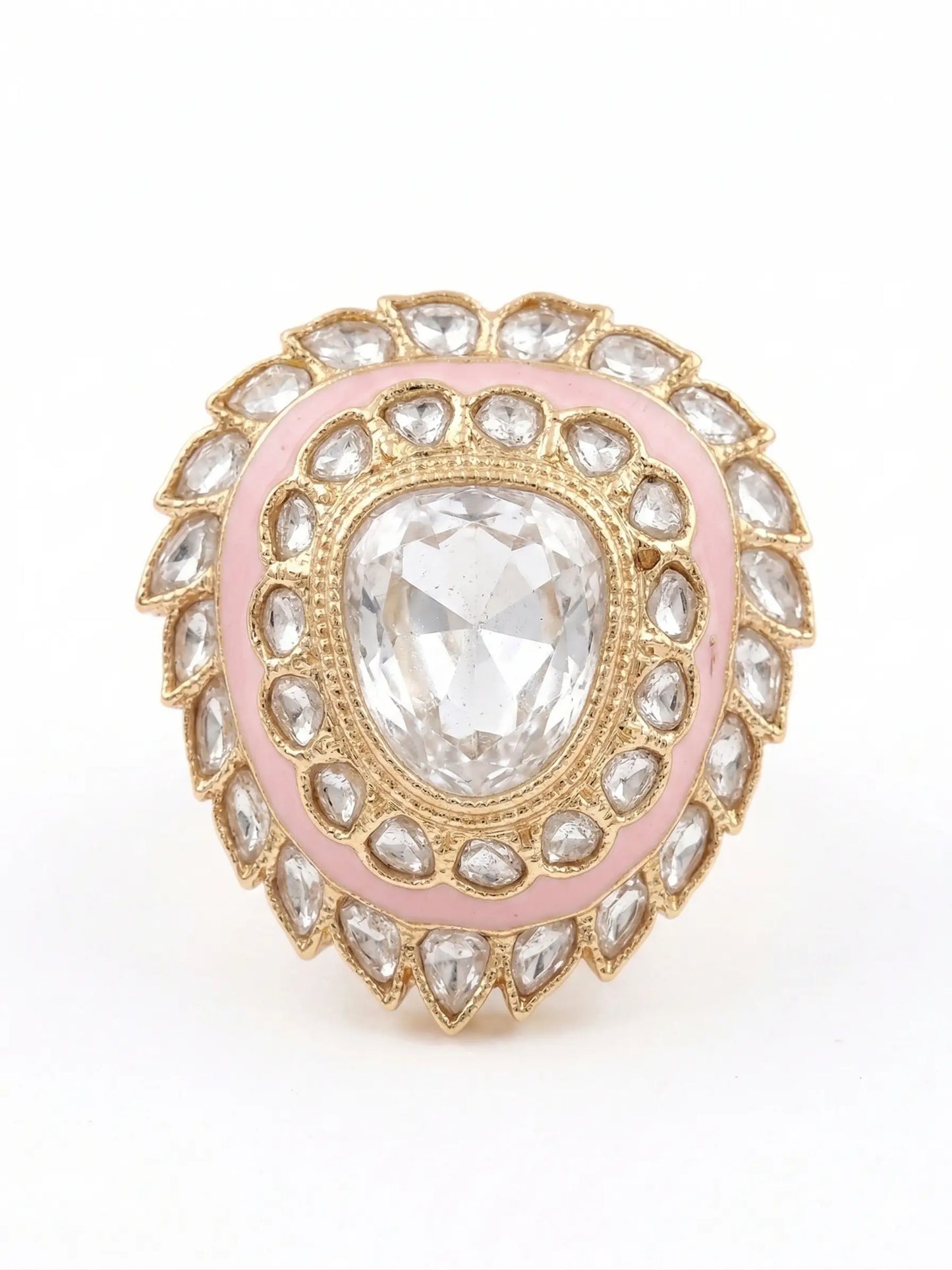 Jewelry ring with pink and gold accents on a white background