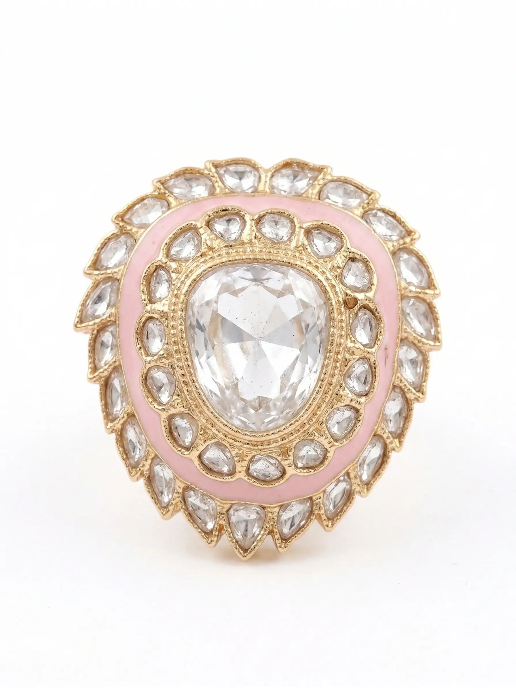 Jewelry ring with pink and gold accents on a white background