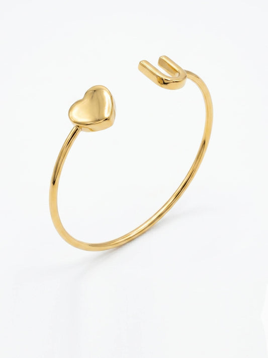 Gold initial U heart open cuff bracelet.