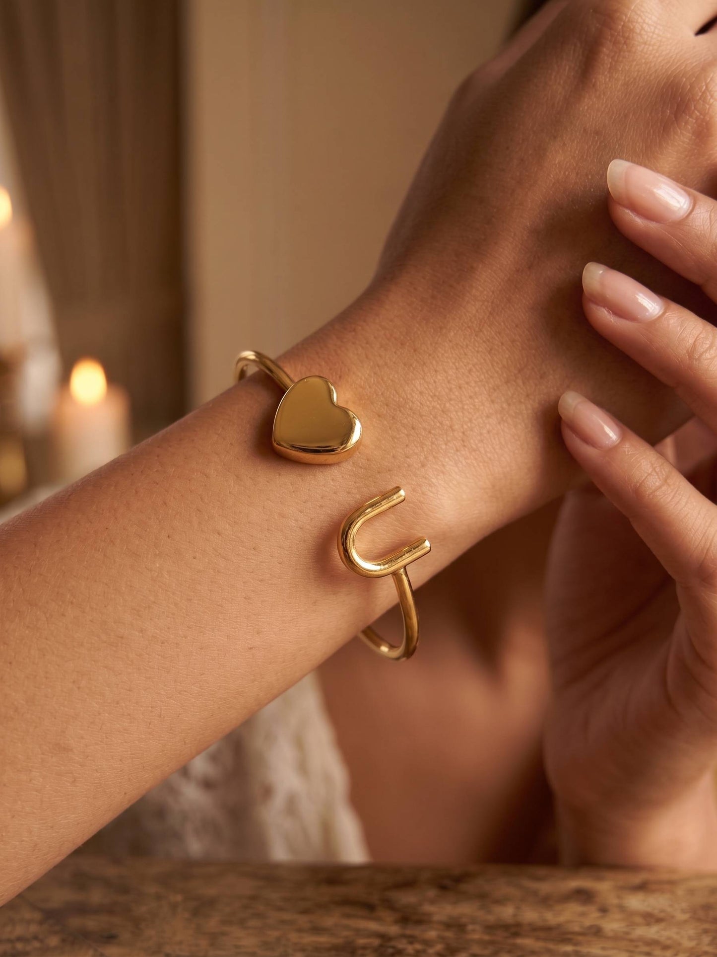 Customizable gold initial bracelet mint velvet display.