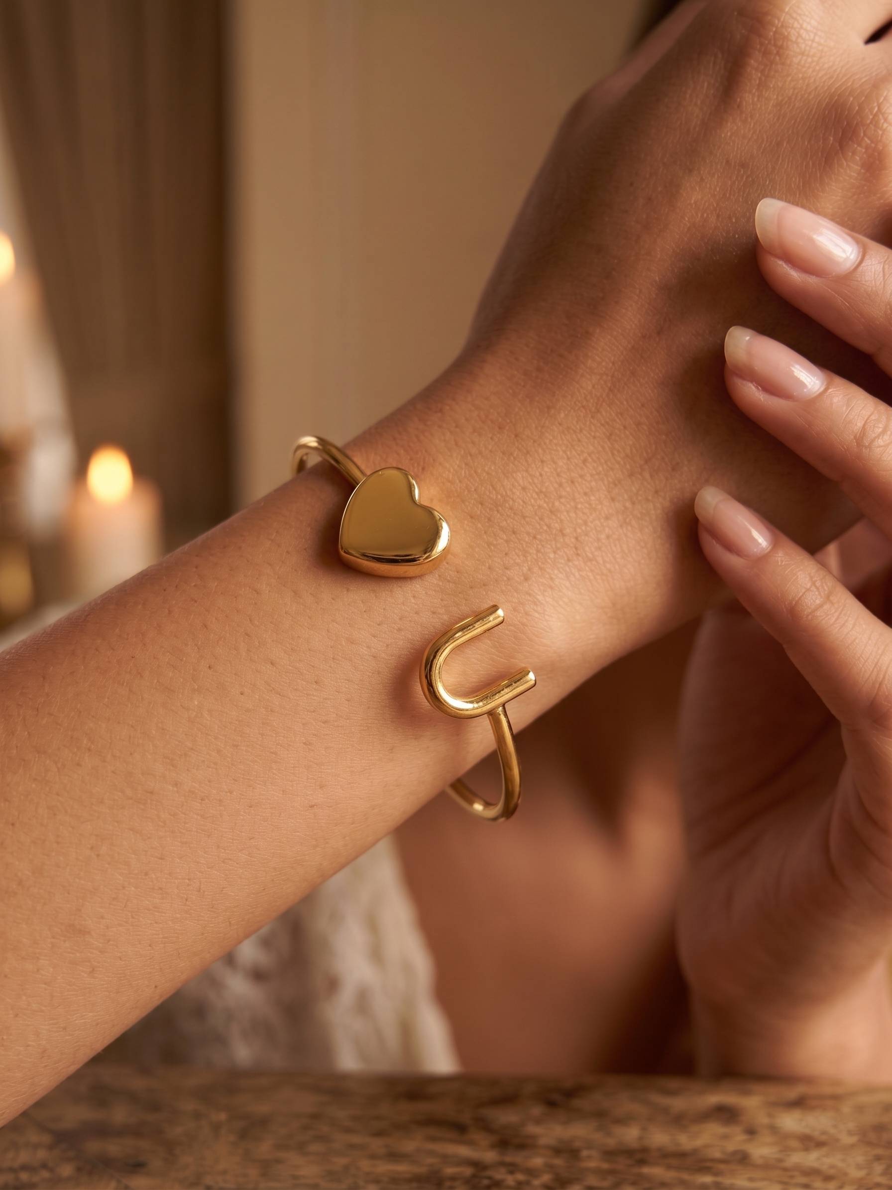 Customizable gold initial bracelet mint velvet display.