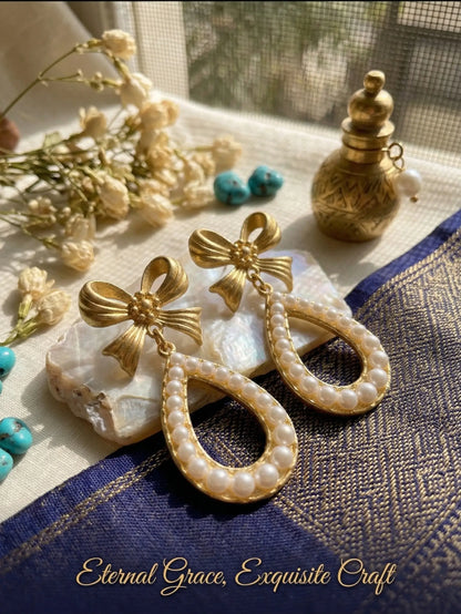 gold-finish bow earrings with teardrop pearl dangle for women girls anti tarnish