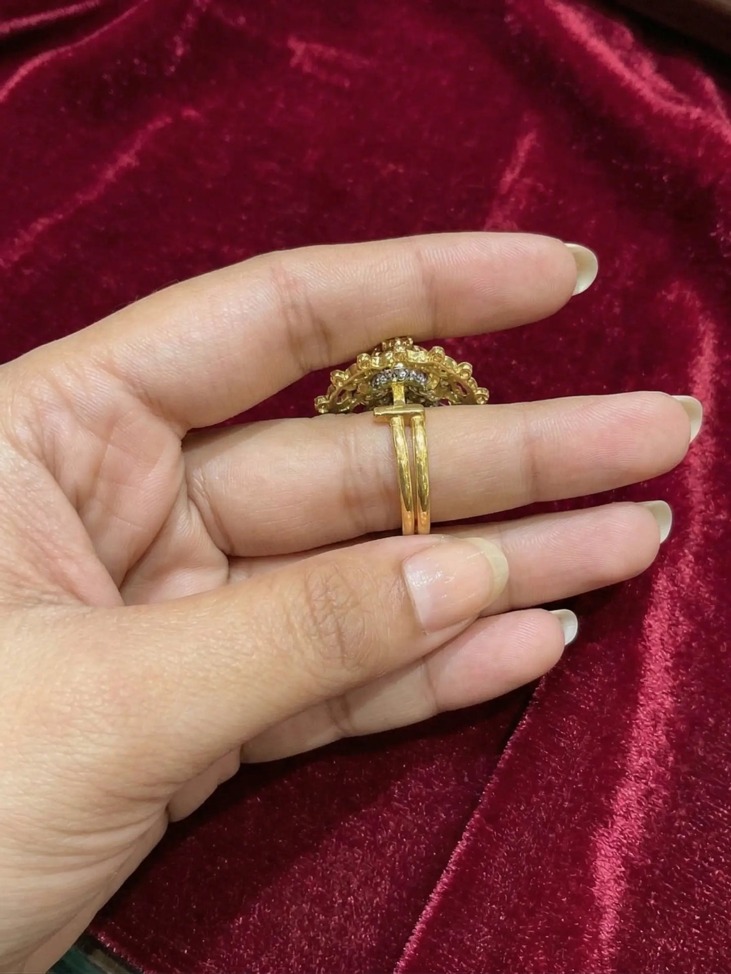 Close-up of a Jewel Street fashion ring for women worn on a finger in a luxury setting