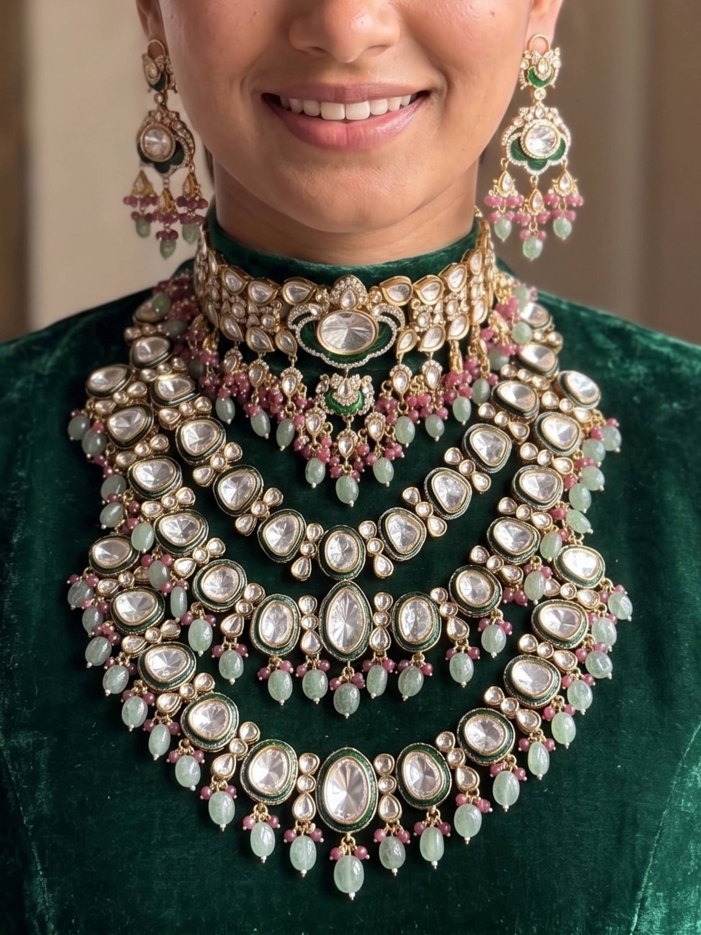 Close-up of a person wearing an elaborate necklace and earrings on a blurred background