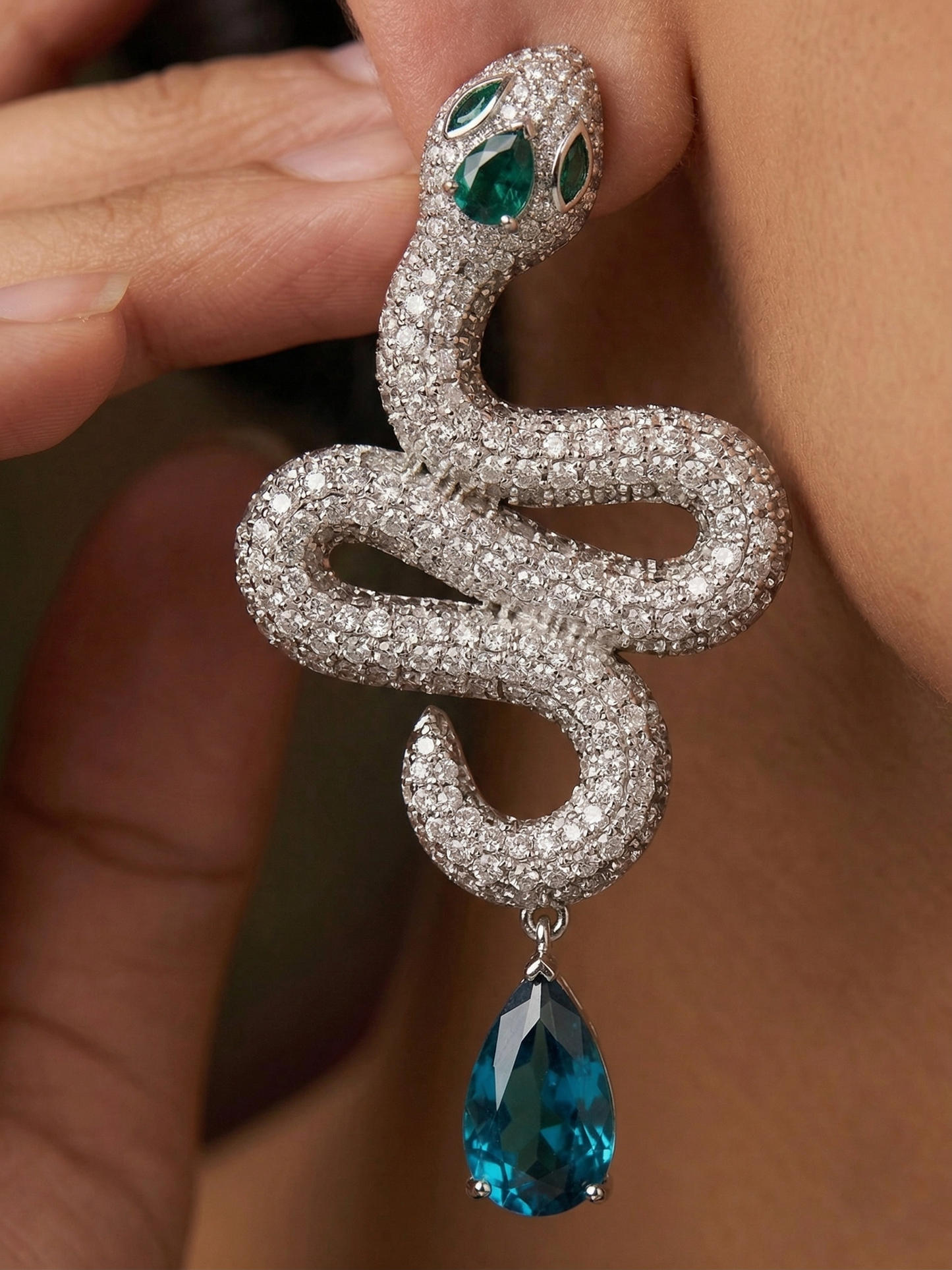 Close-up of snake shaped jewelry with micro CZ diamond pavé