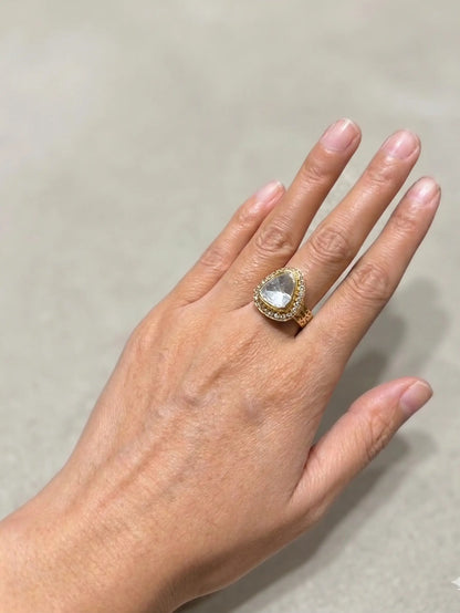 Elegant female engagement rings featuring a minimalist Polki stone design and adjustable band.
