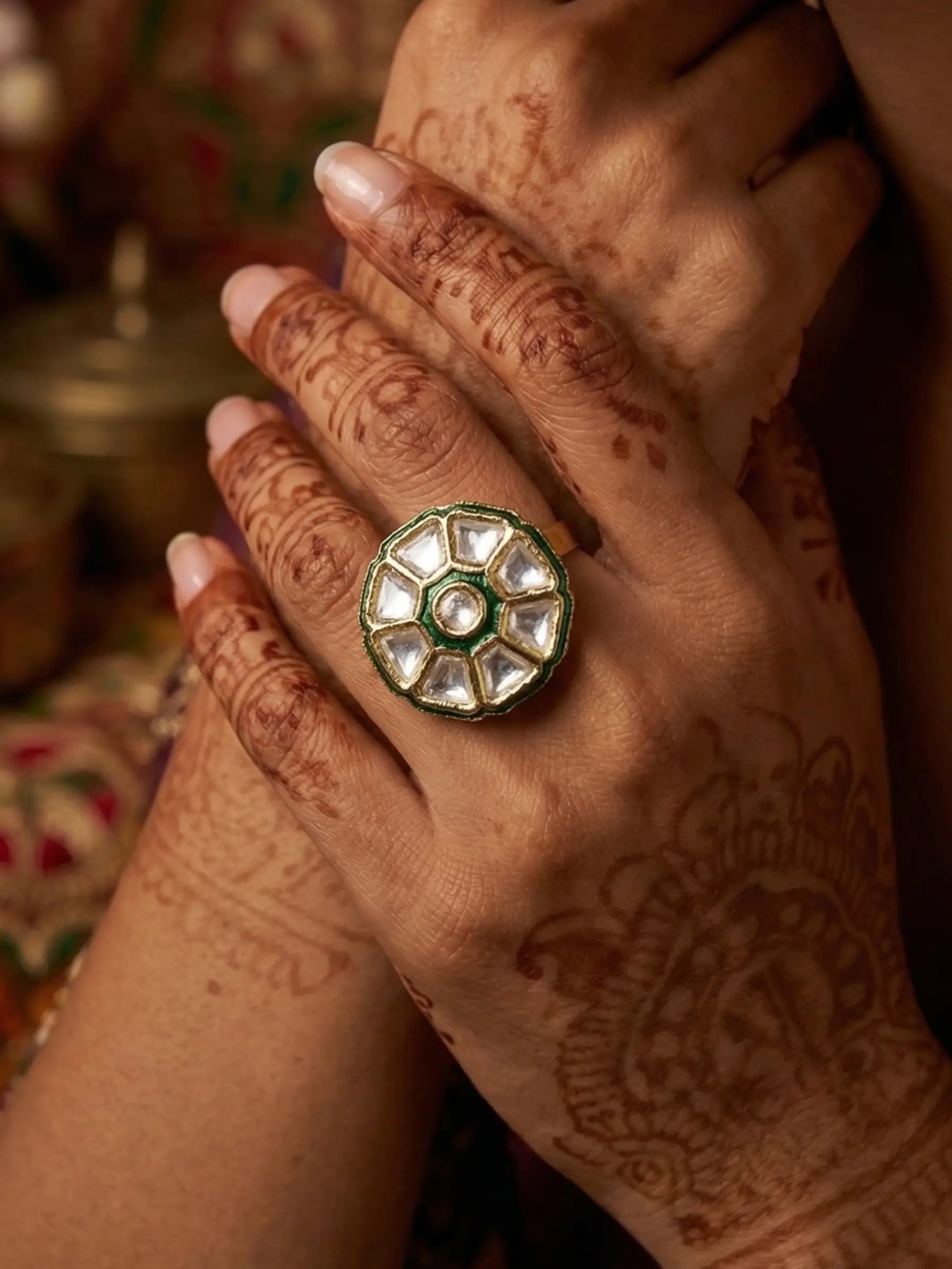 Elegant Polki ring for women with green and white stone detail on a minimalist background