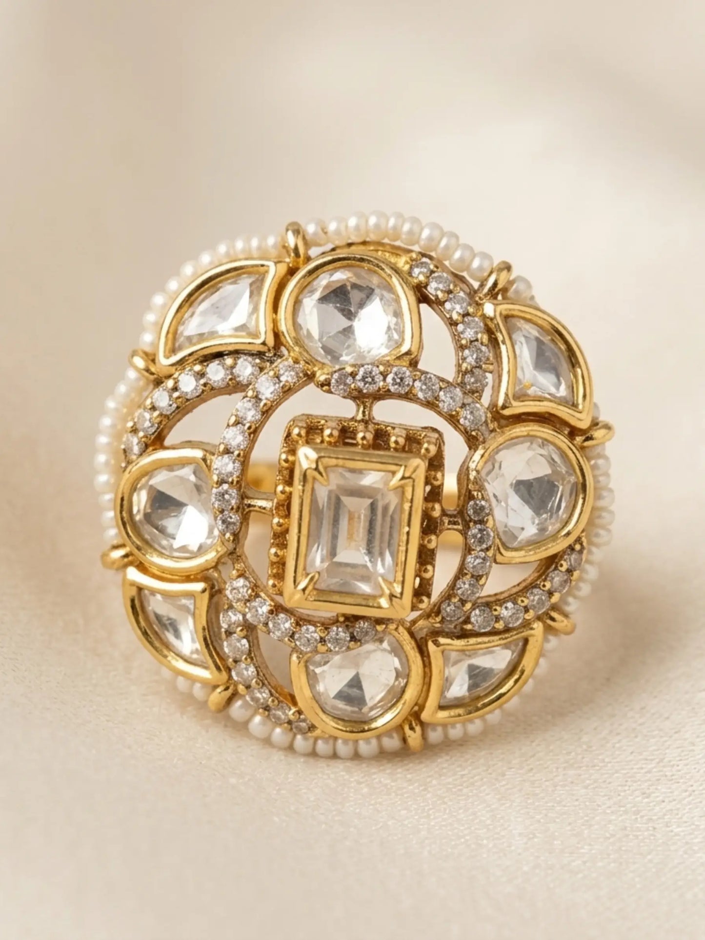 Traditional ladies rings with a sparkling crystal finish displayed on a hand with ethnic mehndi art