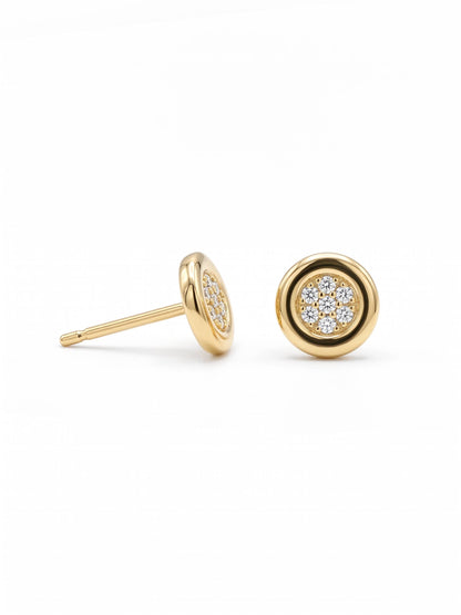 Gold earrings with diamond accents on a white background