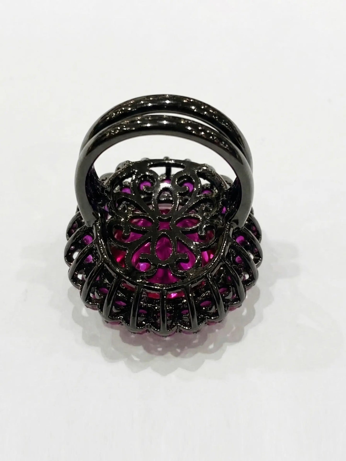 A premium, flower-shaped fashion ring for women, suitable as an alternative female engagement ring or a wedding ring for women, on a seamless white background.