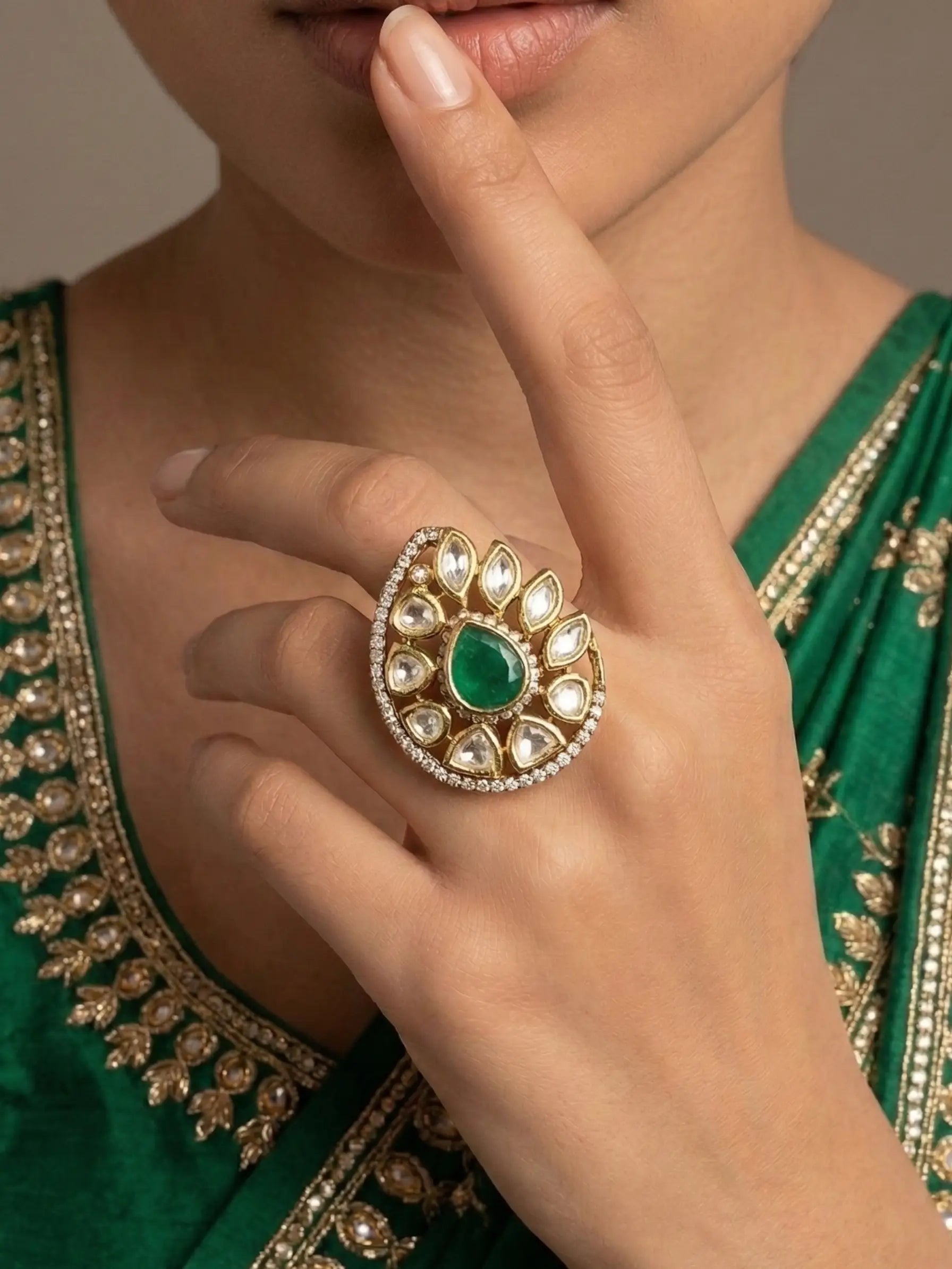Adjustable stone rings for women with emerald green center and kundan work
