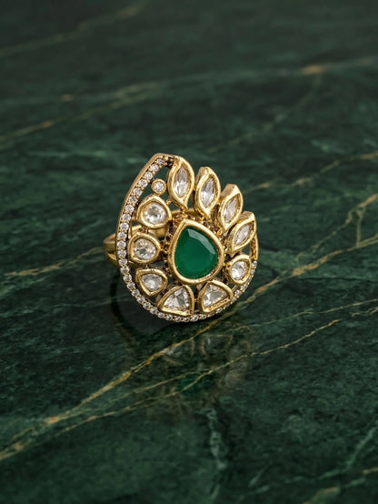 Traditional Indian bridal jewelry ring for women featuring polki and green stone accents
